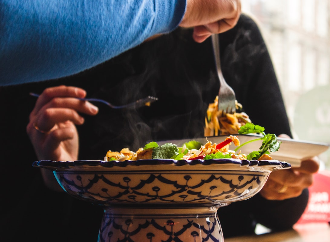 Professional nutritionist reviewing health and nutrition guidelines